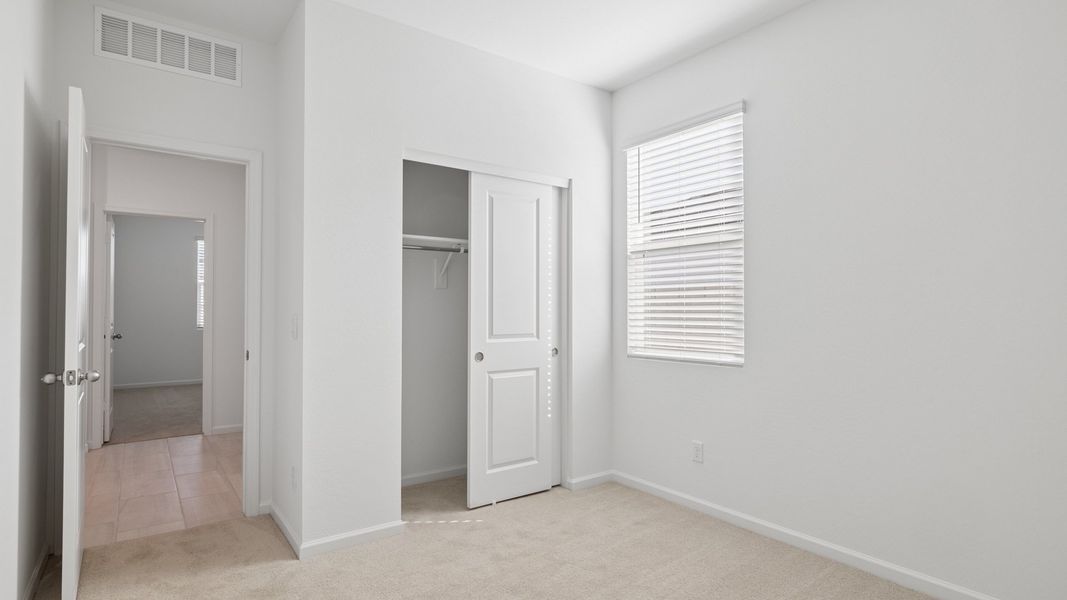 Spacious, unfurnished interior of a new home in Copper Falls, Buckeye (Image 14).