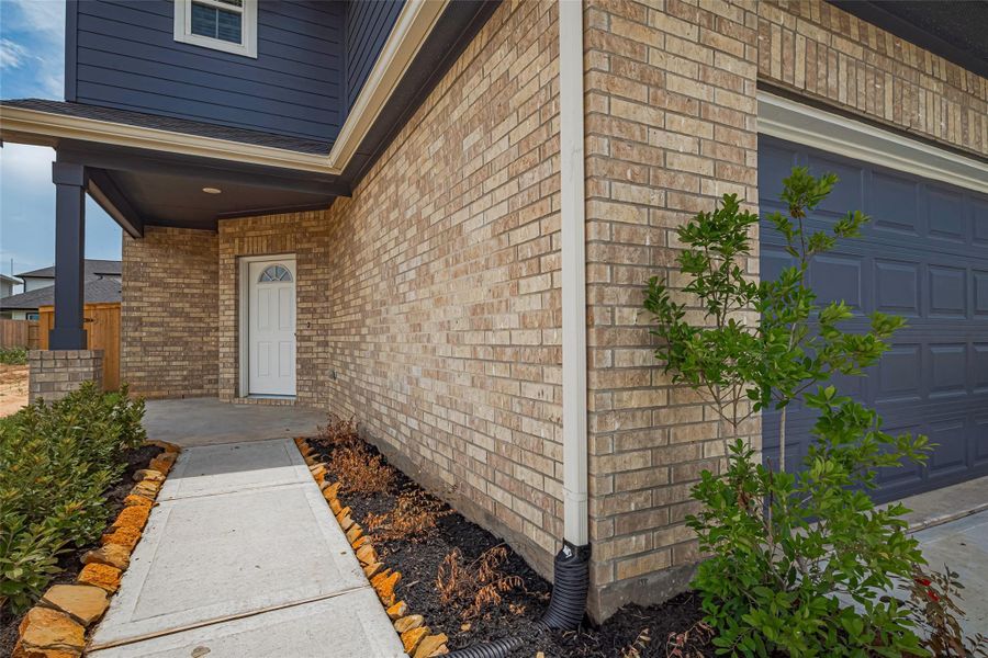 Exterior details and patio area of a home in La Segarra, Brookshire (Image 26).