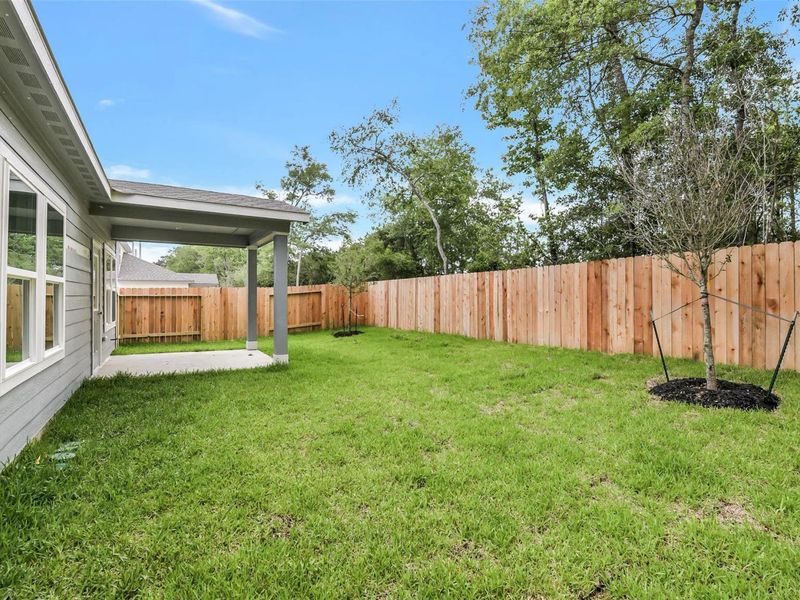 Exterior details and patio area of a home in Caney Creek Place, Conroe (Image 19). Exterior details and patio area of a home in Caney Creek Place, Conroe (Image 19).
