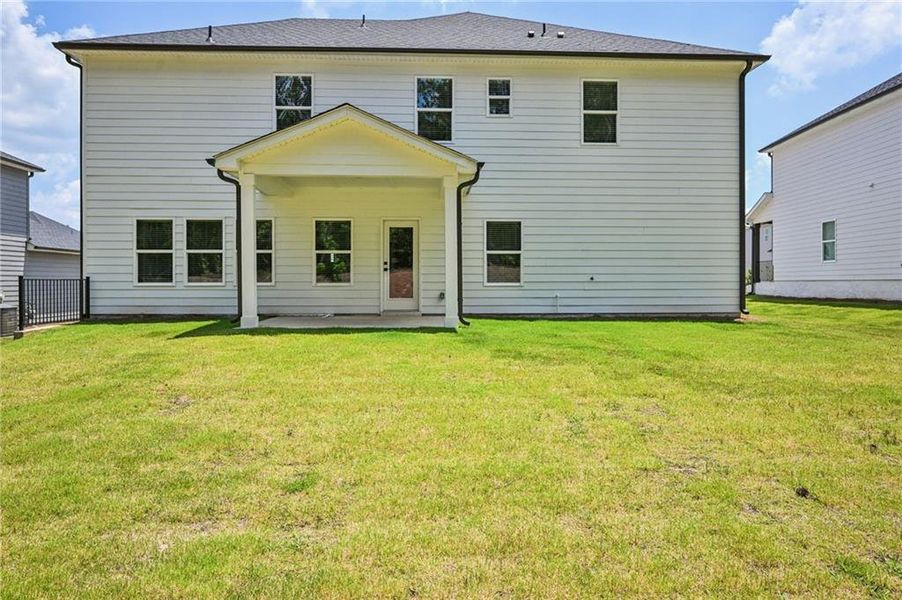 Front exterior of a new home in Vines at Mill Creek - Legacy Series, Braselton, GA, highlighting curb appeal (Image 25).