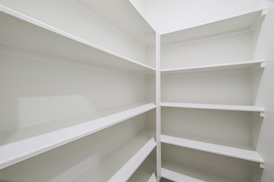 Photos are sample images from a previously built home with the same floor plan. Finishes and fixtures in the current home have been upgraded and may vary.