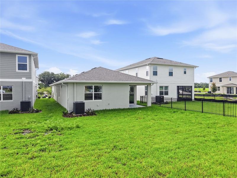Exterior details and patio area of a home in Waterset, Apollo Beach (Image 26).