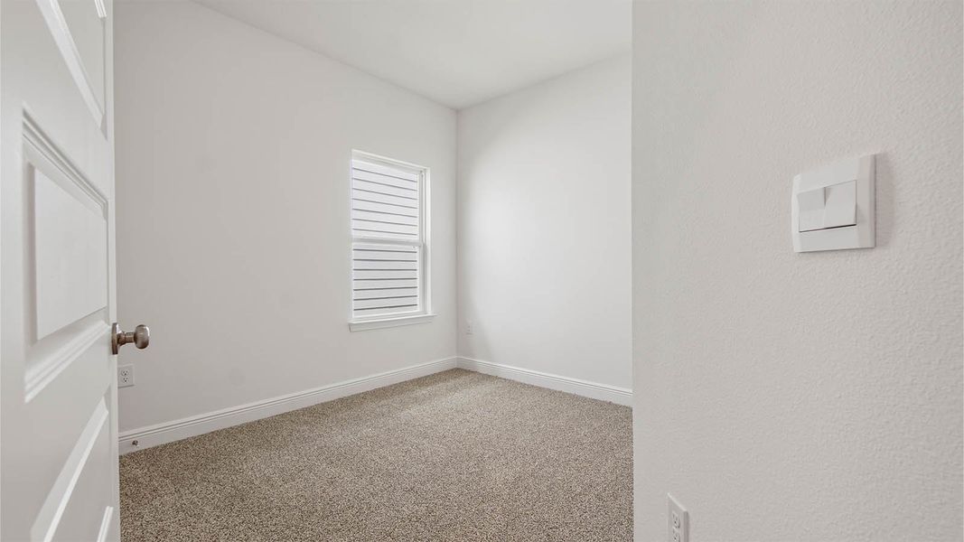 Representative unfurnished interior of a home built from the Kennedy by D.R. Horton in Bayside at Ward Creek, Panama City Beach (Image 36).