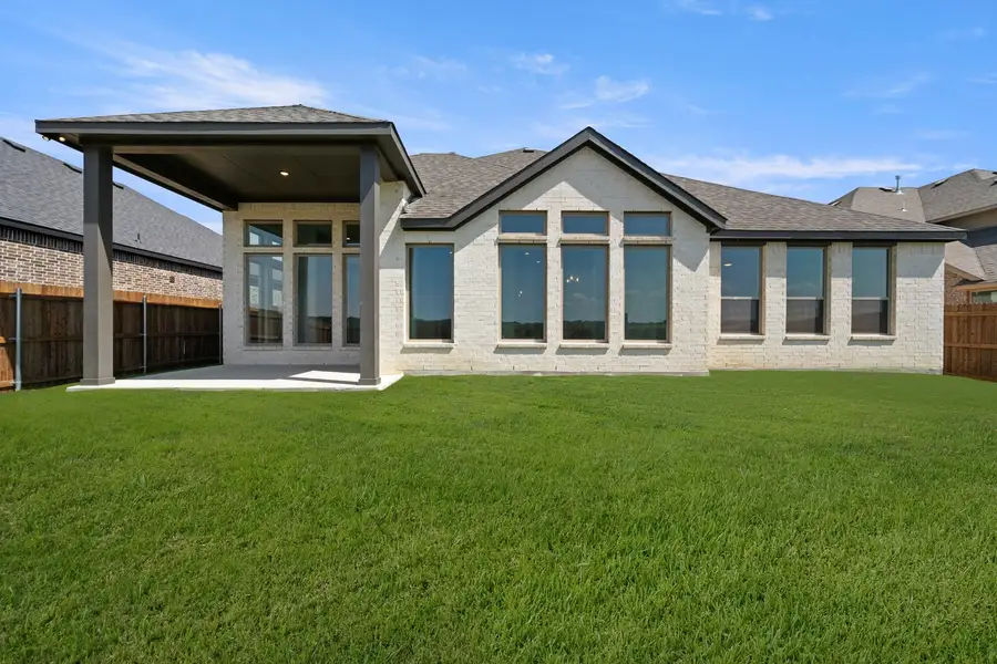 Exterior details and patio area of a home in Panchasarp Farms, Burleson (Image 4).