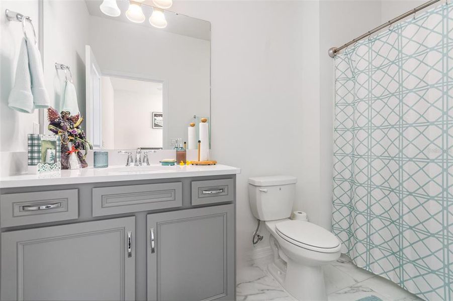 Furnished interior view inside a new home in Tohoqua Reserve, Kissimmee (Image 4).