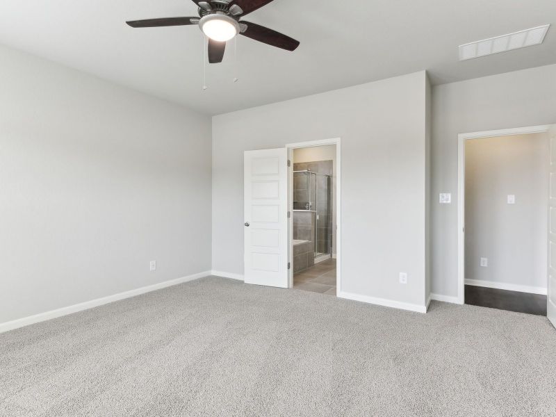 Primary suite in the Matador floorplan at a Meritage Homes community.