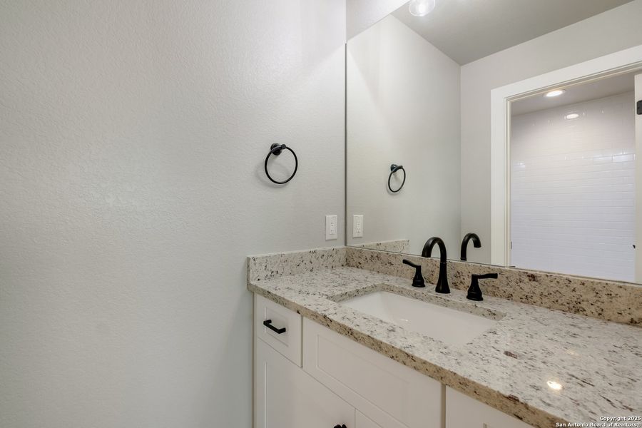 Furnished interior view inside a new home in , Lakehills (Image 11).