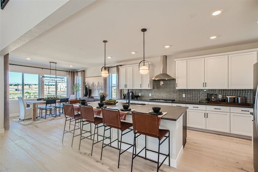 A kitchen with a large island. A kitchen with a large island.