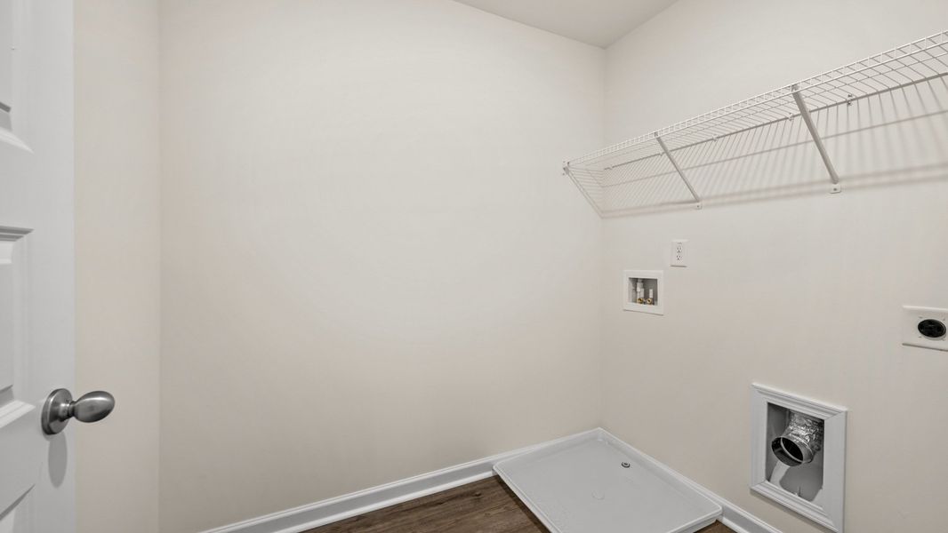 Representative unfurnished interior of a home built from the Salisbury by D.R. Horton in Inverness at Sugarloaf, Lawrenceville (Image 25).