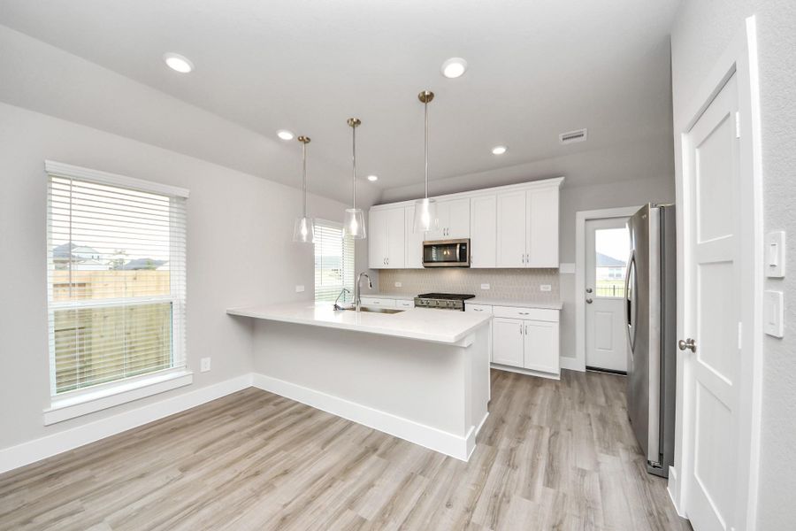 Furnished interior view inside a new home in Laurel Landing: Founders Collection, Alvin (Image 7).