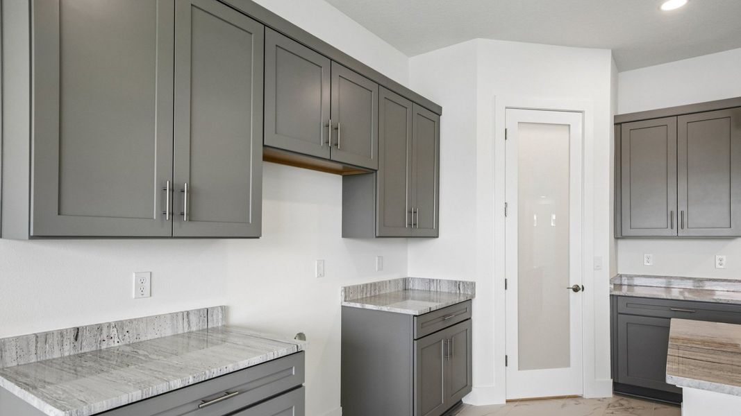 Furnished interior view inside a new home in Biscayne Landing at Seaire, Parrish (Image 11).