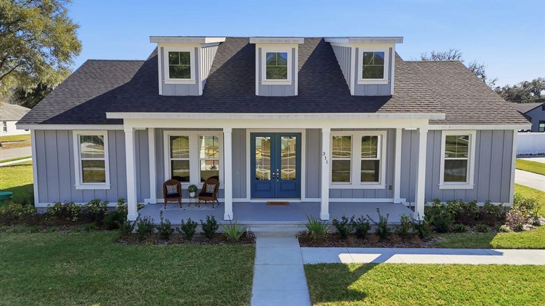 Front exterior of a new home in , Lake Helen, FL, highlighting curb appeal (Image 26).