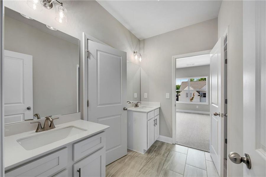 Furnished interior view inside a new home in Hidden Fields, Hoschton (Image 15).