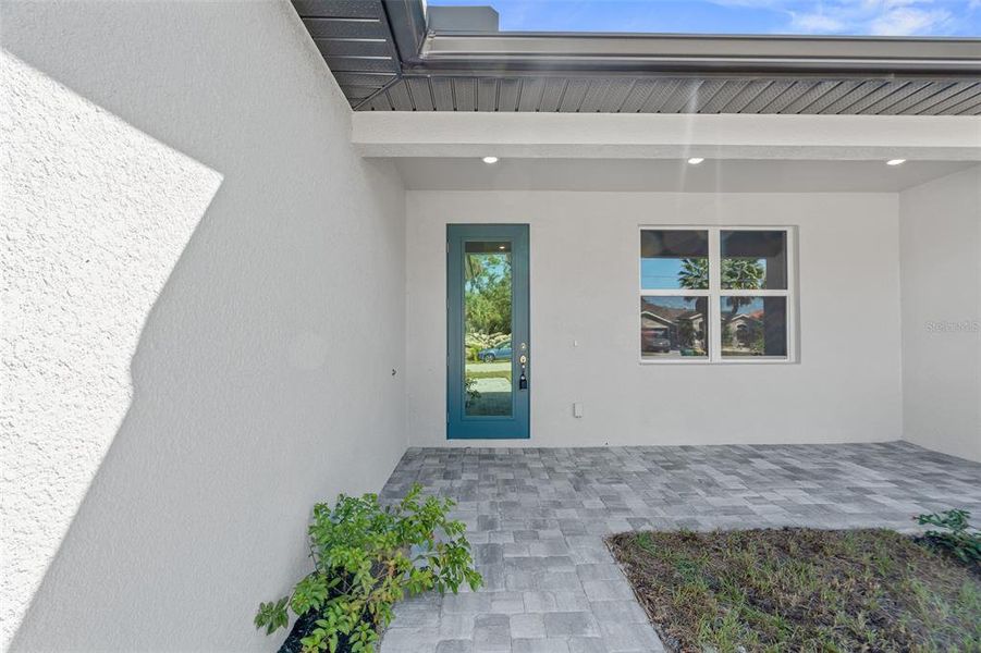 Exterior details and patio area of a home in , North Port (Image 25).