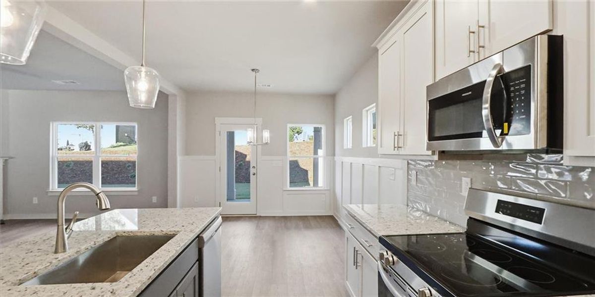 Furnished interior view inside a new home in Traditions of Braselton, Jefferson (Image 5).