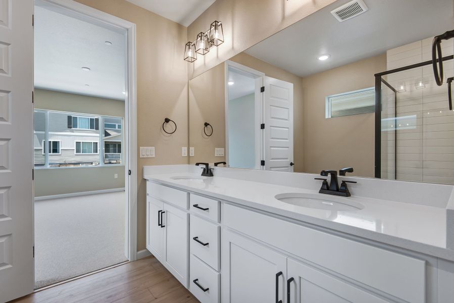 Furnished interior view inside a new home in Reunion, Commerce City (Image 10).