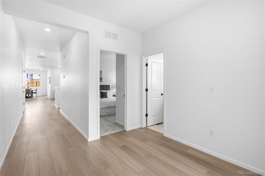 Spacious, unfurnished interior of a new home in The Cottages Collection at Ridgeline Vista, Brighton (Image 23).