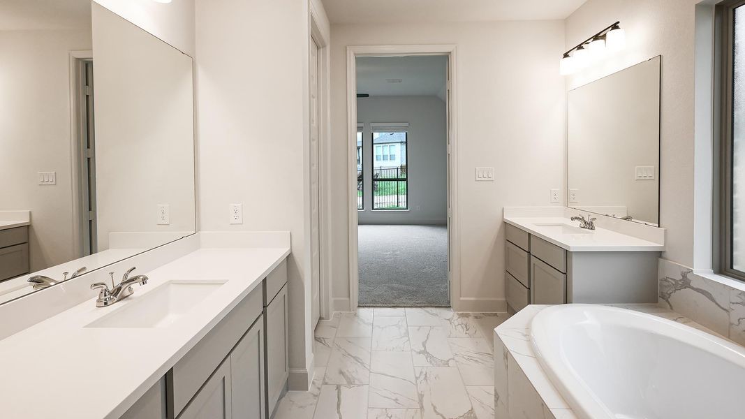Furnished interior view inside a new home in 6 Creeks, Kyle (Image 10).