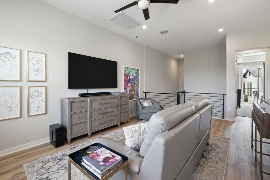A View of the living area with a peek at the primary bedroom A View of the living area with a peek at the primary bedroom