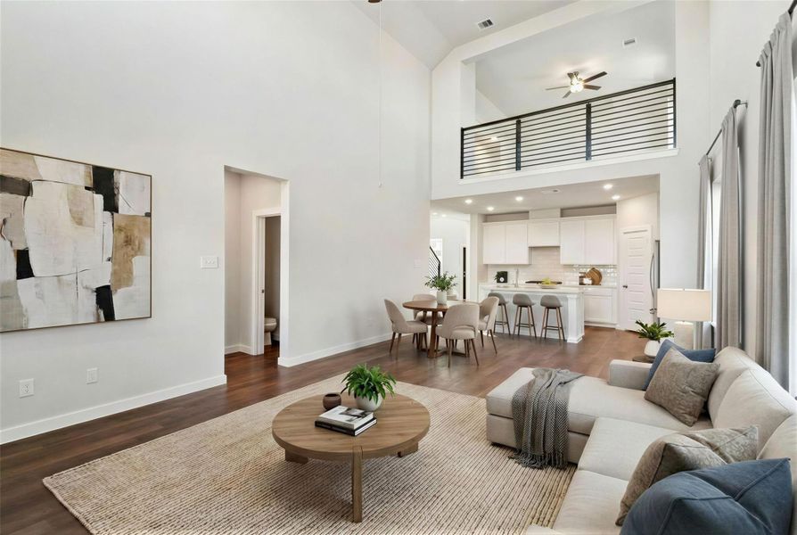 This new move-in-ready home in Brookshire, TX delivers modern design with open living spaces, a well-appointed kitchen and energy-saving features built to last. Virtually staged representation of the family room.