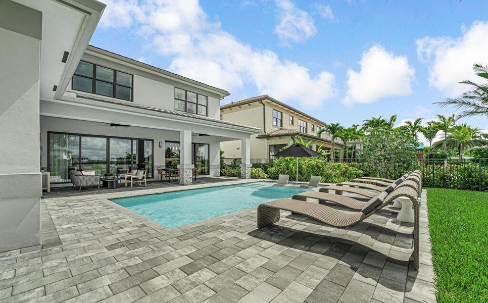 Exterior details and patio area of a home in Apex at Avenir, Palm Beach Gardens (Image 34).