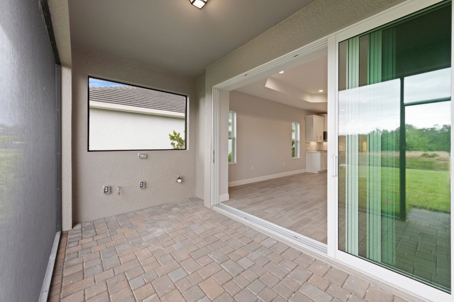 Exterior details and patio area of a home in Verandah, Fort Myers (Image 21).
