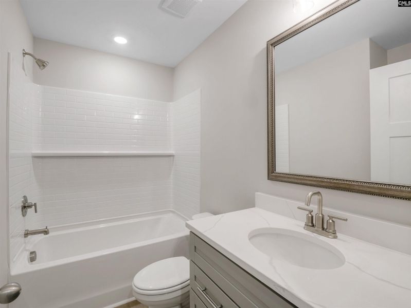 Furnished interior view inside a new home in Collins Cove, Chapin (Image 10). Furnished interior view inside a new home in Collins Cove, Chapin (Image 10).