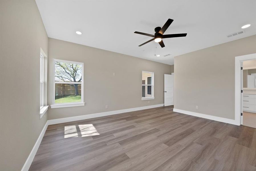 Spacious, unfurnished interior of a new home in , The Colony (Image 25).