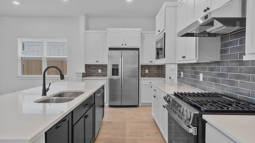 Furnished interior view inside a new home in Wildrye 45', Waller (Image 10).