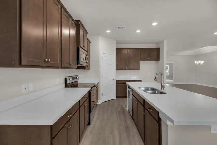 Representative furnished interior of a home built from the Osprey by Holiday Builders in Yellow River Ranch, Milton (Image 4). Representative furnished interior of a home built from the Osprey by Holiday Builders in Yellow River Ranch, Milton (Image 4).