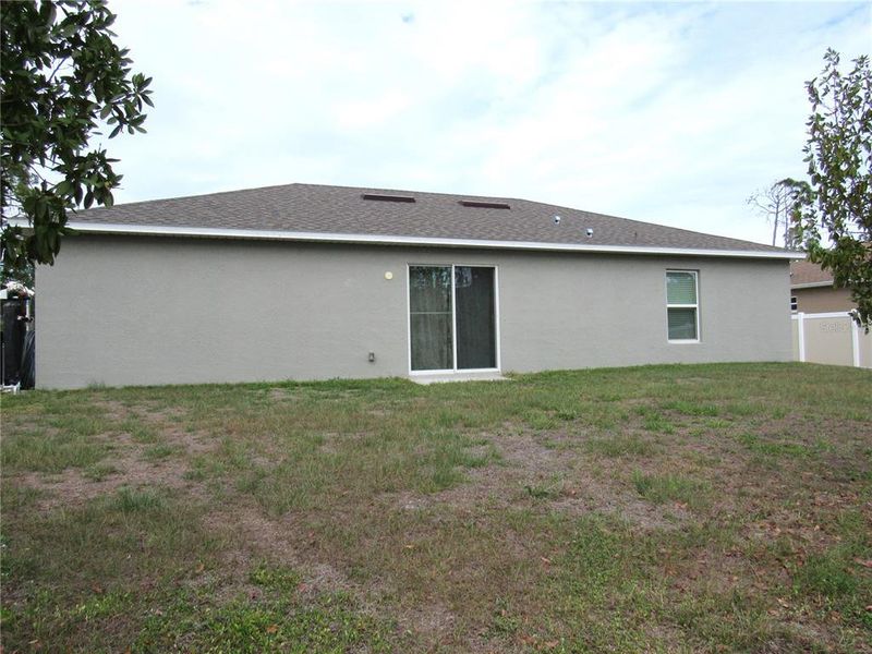 Exterior details and patio area of a home in , North Port (Image 17).
