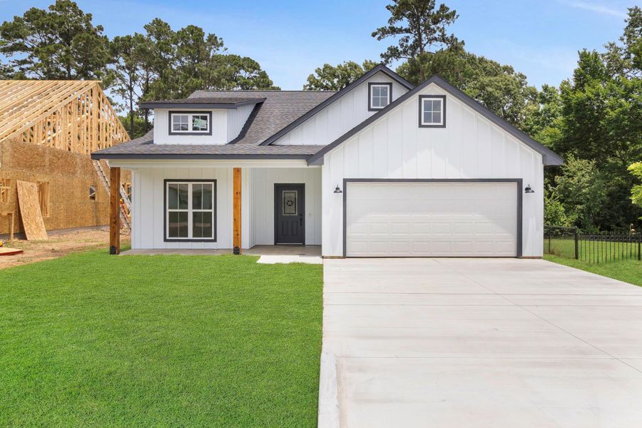 Front exterior of a new home in , Onalaska, TX, highlighting curb appeal (Image 19).