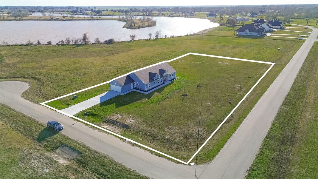 Front exterior of a new home in , Rosharon, TX, highlighting curb appeal (Image 20). Front exterior of a new home in , Rosharon, TX, highlighting curb appeal (Image 20).