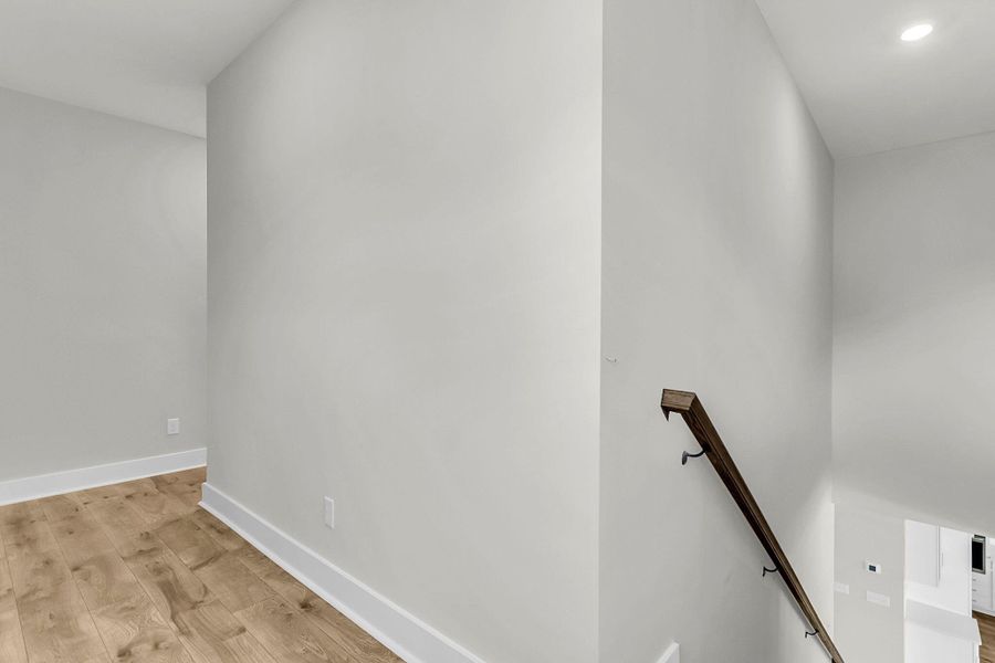 Spacious, unfurnished interior of a new home in Tidewater at Lakes of Cane Bay, Summerville (Image 47).