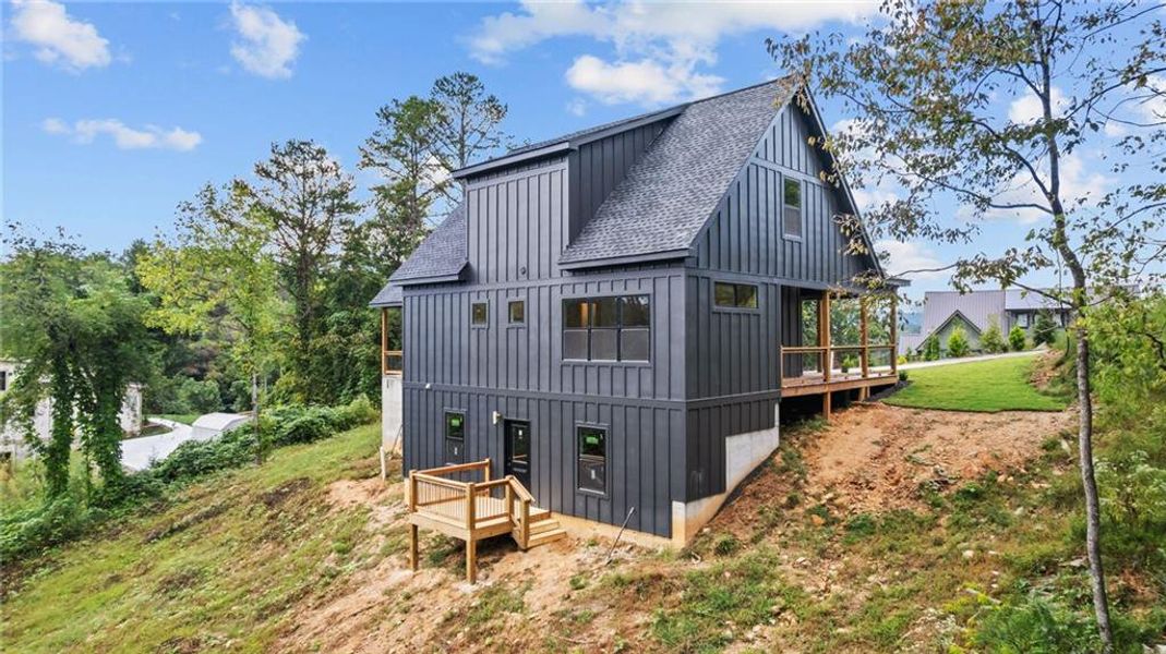 Exterior details and patio area of a home in , Ellijay (Image 29).