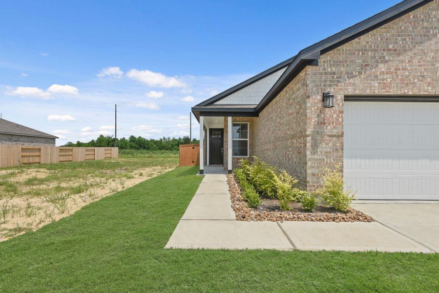 Exterior details and patio area of a home in River Ranch Trails, Dayton (Image 3). Exterior details and patio area of a home in River Ranch Trails, Dayton (Image 3).