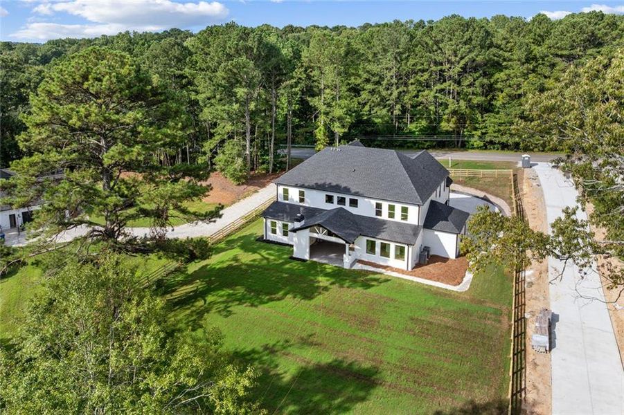 Front exterior of a new home in , Lawrenceville, GA, highlighting curb appeal (Image 26).