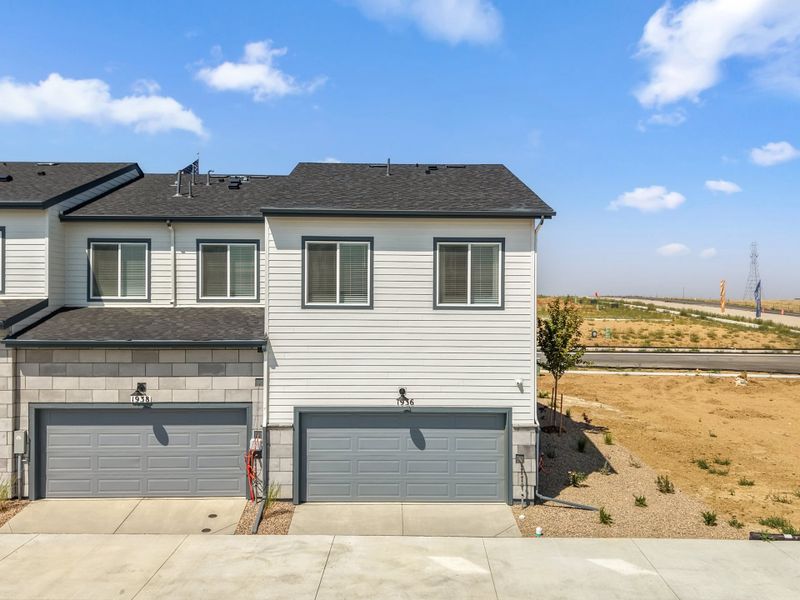 Representative exterior photo of a completed home built from the 2003 by Risewell Homes in Harvest Crossing, Aurora, CO (Image 21).