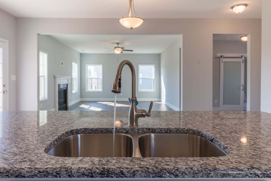 Representative furnished interior of a home built from the Aberdeen by Caviness & Cates Communities in Bartlett Manor, Youngsville (Image 149).