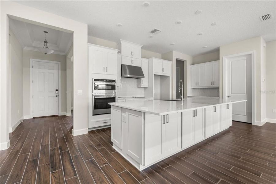 Furnished interior view inside a new home in , Kissimmee (Image 12).