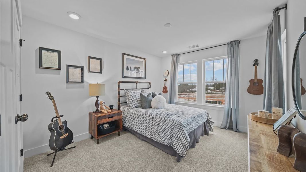 Memorable space offering plush carpet underfoot and a thoughtfully planned walk-in closet