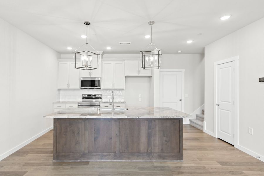 Furnished interior view inside a new home in Wildridge, Oak Point (Image 7).