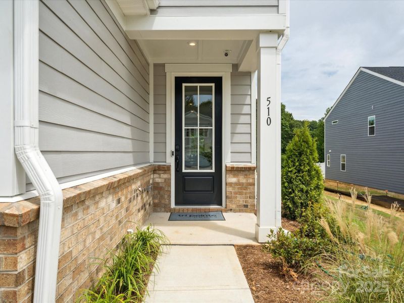 Covered Front Entry.  *Model Photos | Actual Finishes, Structural Selections, and Orientation May Vary.