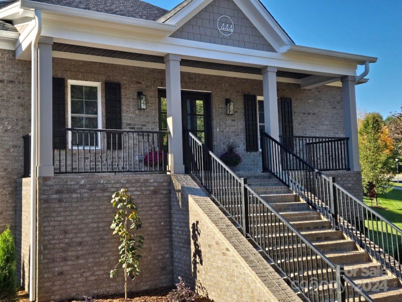 Front exterior of a new home in , Hickory, NC, highlighting curb appeal (Image 1).