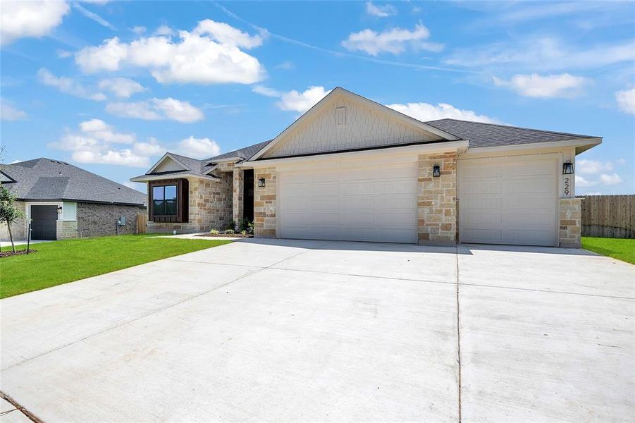 Front exterior of a new home in Rosenthal Estates, Lorena, TX, highlighting curb appeal (Image 1).