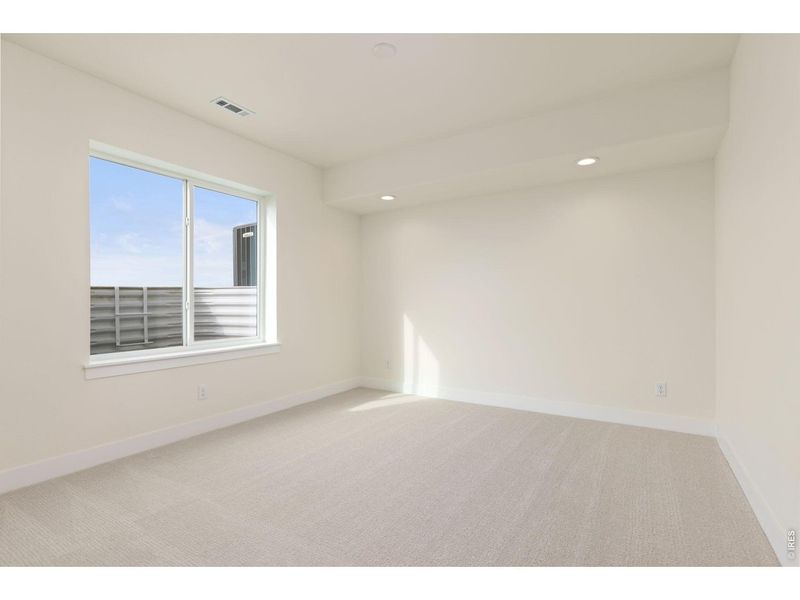 Spacious, unfurnished interior of a new home in RainDance, Windsor (Image 36).