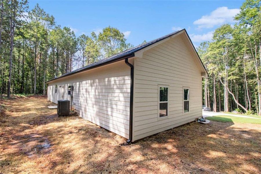 Front exterior of a new home in , Temple, GA, highlighting curb appeal (Image 16).