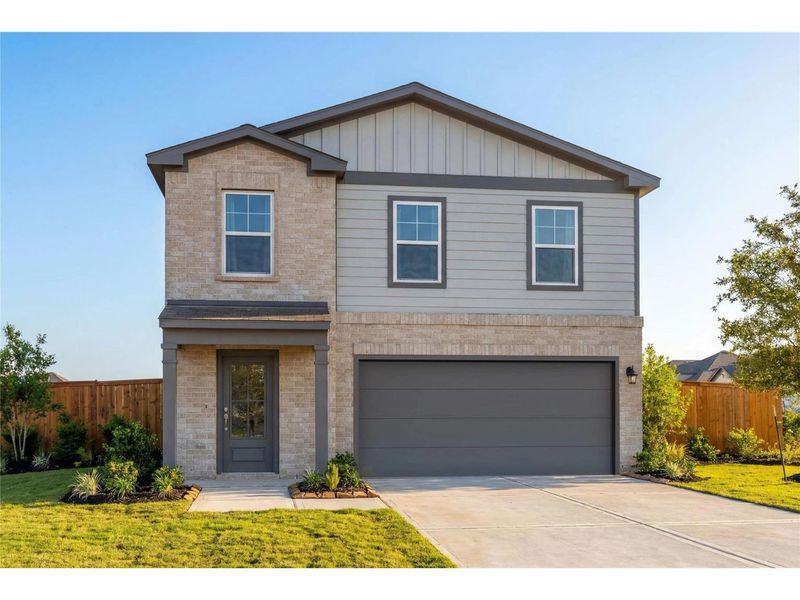 Front exterior of a new home in The Villages at WestPointe, Dayton, TX, highlighting curb appeal (Image 1). Front exterior of a new home in The Villages at WestPointe, Dayton, TX, highlighting curb appeal (Image 1).