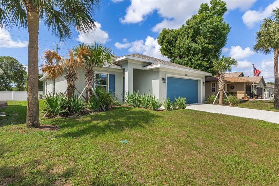 Front exterior of a new home in , Port Charlotte, FL, highlighting curb appeal (Image 28).