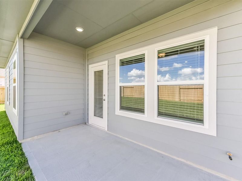 Exterior details and patio area of a home in River Ranch Meadows, Dayton (Image 30).